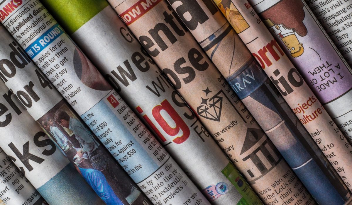 Stacked newspapers close up